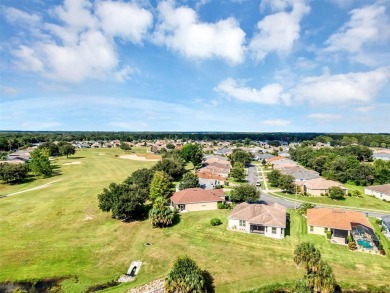 Affordable Low-Maintenance Stucco Home in Guard Gated, Active on Arlington Ridge Golf Club in Florida - for sale on GolfHomes.com, golf home, golf lot