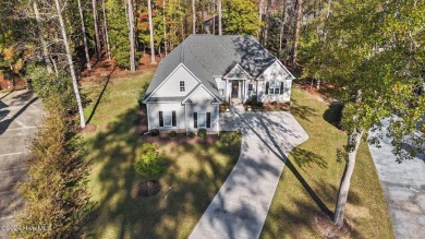 Welcome to this stunning 3-bedroom, 2.5-bathroom home located in on Cypress Landing Golf Club in North Carolina - for sale on GolfHomes.com, golf home, golf lot