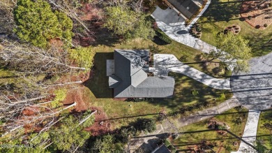 Welcome to this stunning 3-bedroom, 2.5-bathroom home located in on Cypress Landing Golf Club in North Carolina - for sale on GolfHomes.com, golf home, golf lot