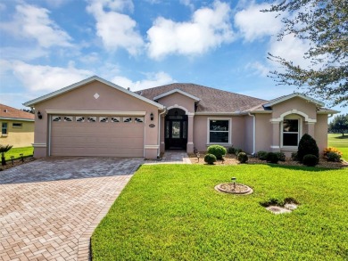 Affordable Low-Maintenance Stucco Home in Guard Gated, Active on Arlington Ridge Golf Club in Florida - for sale on GolfHomes.com, golf home, golf lot