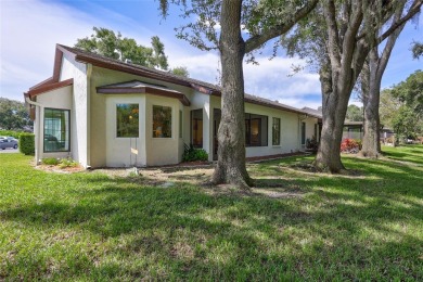 Welcome to this stunning two bedroom, two bath villa nestled in on Highland Lakes Executive Golf Course in Florida - for sale on GolfHomes.com, golf home, golf lot
