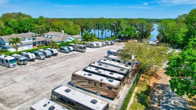 Welcome to this stunning two bedroom, two bath villa nestled in on Highland Lakes Executive Golf Course in Florida - for sale on GolfHomes.com, golf home, golf lot