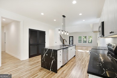 Showcasing this newly designed craftsman home boasts a spacious on Fairfield Plantation Golf and Country Club in Georgia - for sale on GolfHomes.com, golf home, golf lot