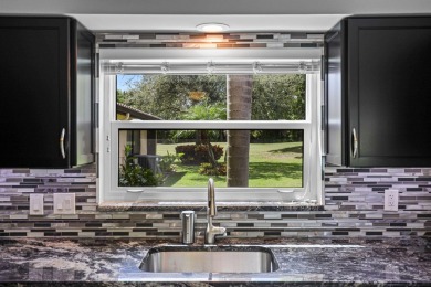 Luxury living in this impeccable End Unit Villa located on on Martin Downs Country Club in Florida - for sale on GolfHomes.com, golf home, golf lot