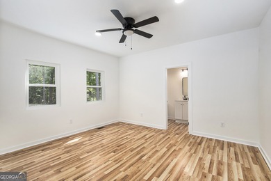 Showcasing this newly designed craftsman home boasts a spacious on Fairfield Plantation Golf and Country Club in Georgia - for sale on GolfHomes.com, golf home, golf lot