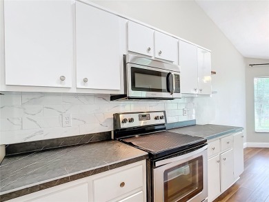PRICE REDUCED - Energy-efficient living in a gated golf on Lake Diamond Golf and Country Club in Florida - for sale on GolfHomes.com, golf home, golf lot