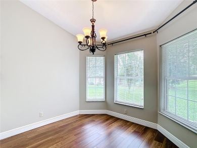 PRICE REDUCED - Energy-efficient living in a gated golf on Lake Diamond Golf and Country Club in Florida - for sale on GolfHomes.com, golf home, golf lot