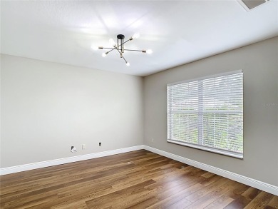 PRICE REDUCED - Energy-efficient living in a gated golf on Lake Diamond Golf and Country Club in Florida - for sale on GolfHomes.com, golf home, golf lot
