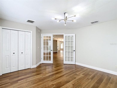 PRICE REDUCED - Energy-efficient living in a gated golf on Lake Diamond Golf and Country Club in Florida - for sale on GolfHomes.com, golf home, golf lot