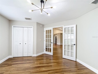 PRICE REDUCED - Energy-efficient living in a gated golf on Lake Diamond Golf and Country Club in Florida - for sale on GolfHomes.com, golf home, golf lot