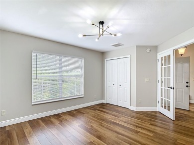 PRICE REDUCED - Energy-efficient living in a gated golf on Lake Diamond Golf and Country Club in Florida - for sale on GolfHomes.com, golf home, golf lot