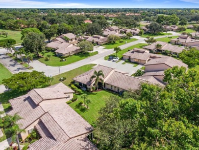 Luxury living in this impeccable End Unit Villa located on on Martin Downs Country Club in Florida - for sale on GolfHomes.com, golf home, golf lot