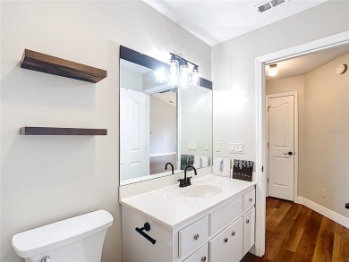 PRICE REDUCED - Energy-efficient living in a gated golf on Lake Diamond Golf and Country Club in Florida - for sale on GolfHomes.com, golf home, golf lot
