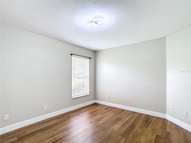 PRICE REDUCED - Energy-efficient living in a gated golf on Lake Diamond Golf and Country Club in Florida - for sale on GolfHomes.com, golf home, golf lot