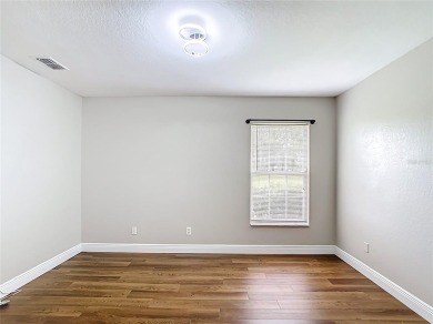 PRICE REDUCED - Energy-efficient living in a gated golf on Lake Diamond Golf and Country Club in Florida - for sale on GolfHomes.com, golf home, golf lot