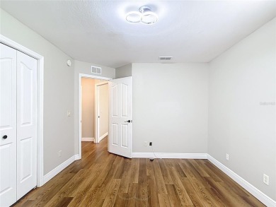 PRICE REDUCED - Energy-efficient living in a gated golf on Lake Diamond Golf and Country Club in Florida - for sale on GolfHomes.com, golf home, golf lot