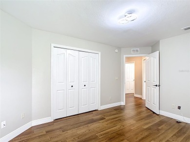 PRICE REDUCED - Energy-efficient living in a gated golf on Lake Diamond Golf and Country Club in Florida - for sale on GolfHomes.com, golf home, golf lot