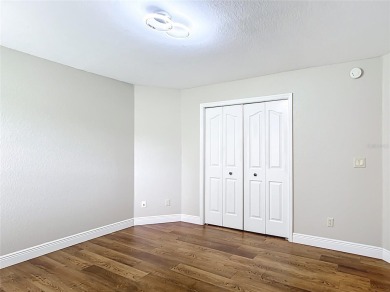 PRICE REDUCED - Energy-efficient living in a gated golf on Lake Diamond Golf and Country Club in Florida - for sale on GolfHomes.com, golf home, golf lot