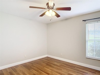 PRICE REDUCED - Energy-efficient living in a gated golf on Lake Diamond Golf and Country Club in Florida - for sale on GolfHomes.com, golf home, golf lot