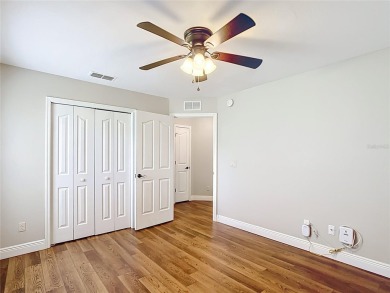 PRICE REDUCED - Energy-efficient living in a gated golf on Lake Diamond Golf and Country Club in Florida - for sale on GolfHomes.com, golf home, golf lot