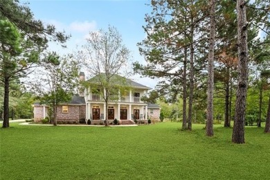 Nestled within the gates of Money Hill, this stunning two-story on Money Hill Golf and Country Club in Louisiana - for sale on GolfHomes.com, golf home, golf lot