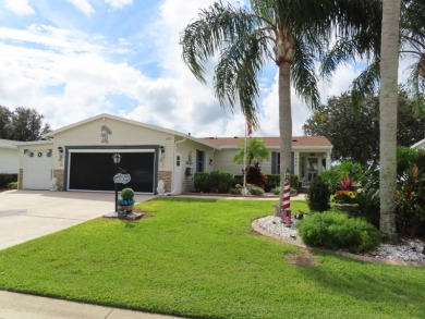This great home has one of the best curb appeals in the entire on Crane Lakes Golf and Country Club in Florida - for sale on GolfHomes.com, golf home, golf lot