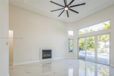 Complete modern remodeling. New Roof with 3 solar fans, Full on Heron Bay Golf Club in Florida - for sale on GolfHomes.com, golf home, golf lot