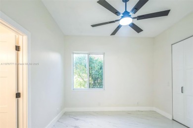 Complete modern remodeling. New Roof with 3 solar fans, Full on Heron Bay Golf Club in Florida - for sale on GolfHomes.com, golf home, golf lot