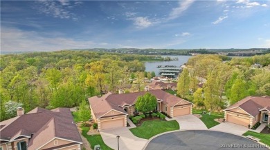 LAKE OF THE OZARKS - This exceptional townhome, nestled in the on The Club At Porto Cima in Missouri - for sale on GolfHomes.com, golf home, golf lot