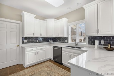 LAKE OF THE OZARKS - This exceptional townhome, nestled in the on The Club At Porto Cima in Missouri - for sale on GolfHomes.com, golf home, golf lot