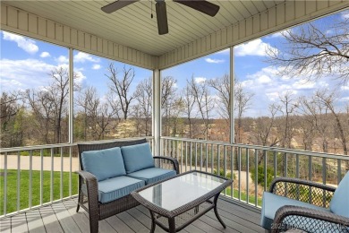 LAKE OF THE OZARKS - This exceptional townhome, nestled in the on The Club At Porto Cima in Missouri - for sale on GolfHomes.com, golf home, golf lot