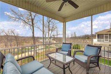 LAKE OF THE OZARKS - This exceptional townhome, nestled in the on The Club At Porto Cima in Missouri - for sale on GolfHomes.com, golf home, golf lot