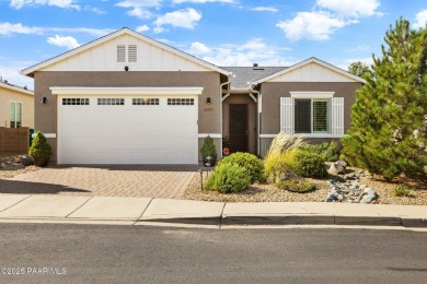 Step into this immaculately maintained 2-bedroom, 2-bathroom on Quail Wood Greens Golf Course in Arizona - for sale on GolfHomes.com, golf home, golf lot