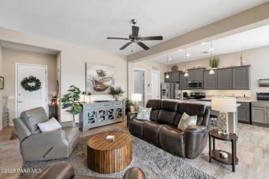 Step into this immaculately maintained 2-bedroom, 2-bathroom on Quail Wood Greens Golf Course in Arizona - for sale on GolfHomes.com, golf home, golf lot