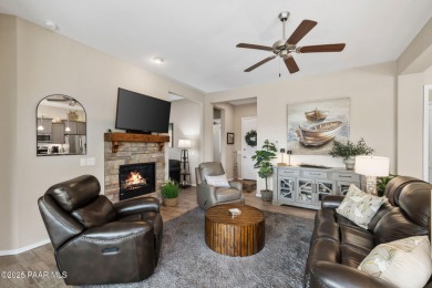 Step into this immaculately maintained 2-bedroom, 2-bathroom on Quail Wood Greens Golf Course in Arizona - for sale on GolfHomes.com, golf home, golf lot
