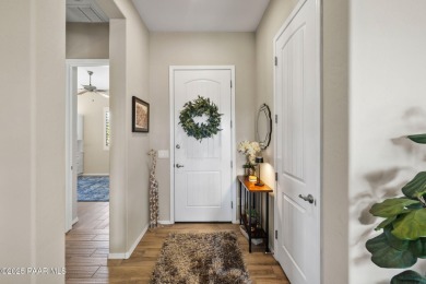 Step into this immaculately maintained 2-bedroom, 2-bathroom on Quail Wood Greens Golf Course in Arizona - for sale on GolfHomes.com, golf home, golf lot