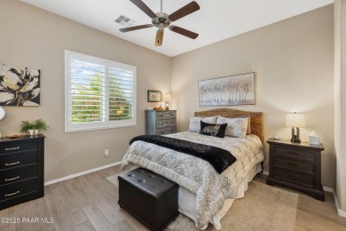 Step into this immaculately maintained 2-bedroom, 2-bathroom on Quail Wood Greens Golf Course in Arizona - for sale on GolfHomes.com, golf home, golf lot