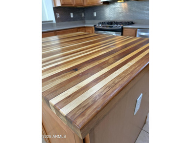 This beautiful 1,926 sq ft home is nestled on tree-lined streets on Verrado Golf Club  in Arizona - for sale on GolfHomes.com, golf home, golf lot