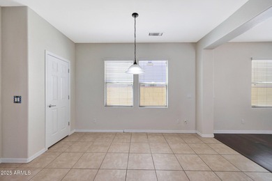 This beautiful 1,926 sq ft home is nestled on tree-lined streets on Verrado Golf Club  in Arizona - for sale on GolfHomes.com, golf home, golf lot