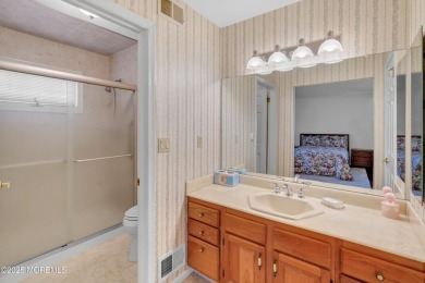 Welcome to 1504 Serrata Way, a beautifully maintained 2-bedroom on Greenbriar Woodlands in New Jersey - for sale on GolfHomes.com, golf home, golf lot