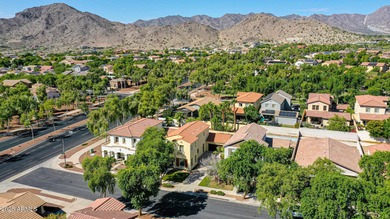 This beautiful 1,926 sq ft home is nestled on tree-lined streets on Verrado Golf Club  in Arizona - for sale on GolfHomes.com, golf home, golf lot