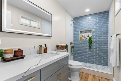 Step into this beautifully renovated two-story home, offering on Hilo Municipal Golf Course in Hawaii - for sale on GolfHomes.com, golf home, golf lot