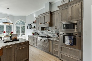 Step into a space where legacy and luxury meet. Tucked inside on Hamilton Mill Golf Club in Georgia - for sale on GolfHomes.com, golf home, golf lot