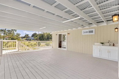 Step into this beautifully renovated two-story home, offering on Hilo Municipal Golf Course in Hawaii - for sale on GolfHomes.com, golf home, golf lot