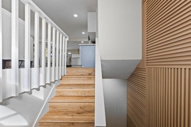 Step into this beautifully renovated two-story home, offering on Hilo Municipal Golf Course in Hawaii - for sale on GolfHomes.com, golf home, golf lot