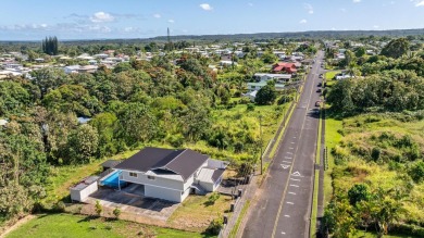 Step into this beautifully renovated two-story home, offering on Hilo Municipal Golf Course in Hawaii - for sale on GolfHomes.com, golf home, golf lot