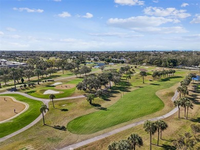 Step into a lifestyle of ease and elegance in this meticulously on Largo Golf Course in Florida - for sale on GolfHomes.com, golf home, golf lot