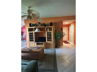 Beautifully Furnished End Unit with Lake Views! Discover the on Cypress Woods Golf and Country Club in Florida - for sale on GolfHomes.com, golf home, golf lot