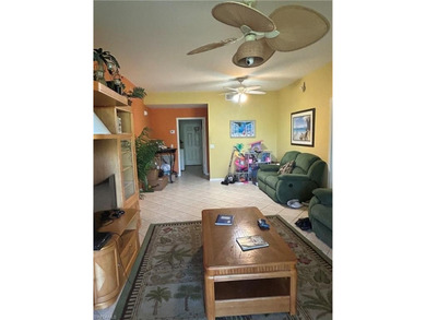 Beautifully Furnished End Unit with Lake Views! Discover the on Cypress Woods Golf and Country Club in Florida - for sale on GolfHomes.com, golf home, golf lot