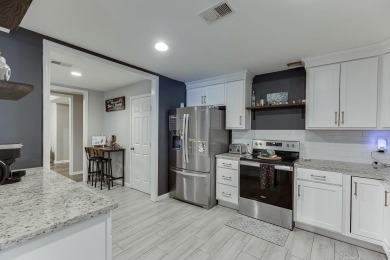 Step into a space where legacy and luxury meet. Tucked inside on Hamilton Mill Golf Club in Georgia - for sale on GolfHomes.com, golf home, golf lot